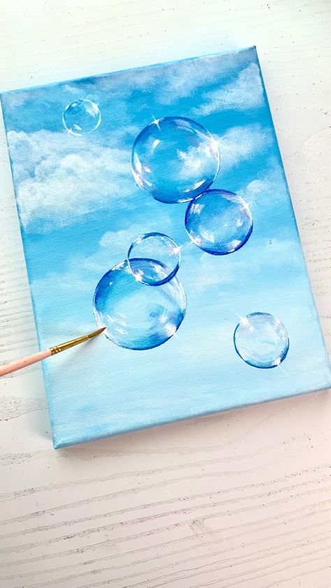 Painting Bubbles On White Background, Bubbles In The Sky, Bubbles Acrylic Painting, Bubble Painting Easy, How To Paint Bubbles Acrylic, Acrylic Bubble Painting, Paintings With Blue Backgrounds, How To Paint Bubbles, Watercolor Bubbles Painting