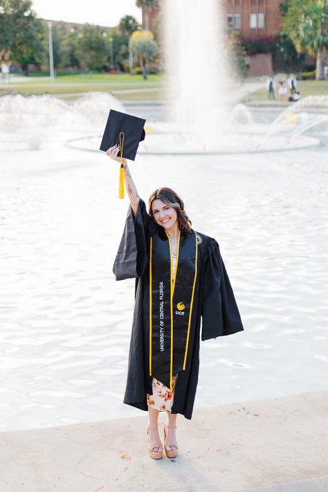 A fun University of Central Florida Graduation Photoshoot at the Orlando Campus! Click the link for tips on how to make the most of your UCF Graduation Photoshoot! Graduation Pictures Ucf, Ucf Graduation Pictures, Grad Pic Poses, Ucf Graduation, Ucf Grad, Grad Pics Ideas, Reflection Pond, Grad Photo Ideas, Graduation Pic