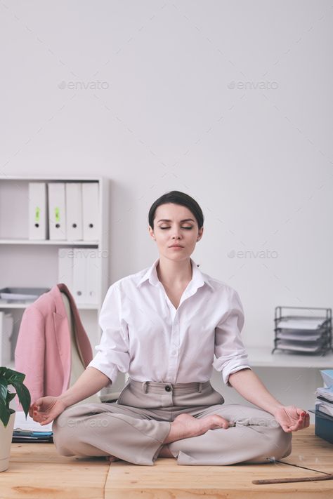 Calm businesswoman meditating in office by Pressmaster. Calm young businesswoman with closed eyes sitting in zen-like position and meditating in office #AD #office, #Pressmaster, #meditating, #Calm Zen Meditation, Closed Eyes, Business Women, Dream Life, Zen, Meditation, Spirituality, Mindfulness, Quick Saves