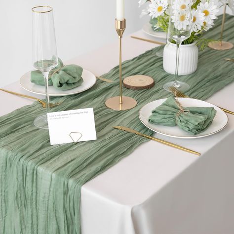 PRICES MAY VARY. 100% Woven Cotton 1 x table runner measures 300cm x 90 cm / 118 inches x 35 inches 6 x napkins are 50cm x 50cm / 19.7 inches x 19.7 inches ( 6 napkins) Cheesecloth, crinkled effect. A high quality product made from woven cotton. The cheesecloth table runner and 6 napkins set is crinkled in look, soft and perfect for your table setting. The fabric has an organic, rustic, natural, boho and vintage look and feel and is perfect for any event/party. Wedding Tables, picnic tables, bbq Sage Green Bridal Shower Table Ideas, Sage Green Engagement Party Decor, Birthday Brunch Party Decorations Color Schemes, Wedding Plate Settings, Green Table Runner Wedding, Sage Green Table Setting, Teal Party Decor, Green Table Decorations, Sage Green Wedding Table Setting