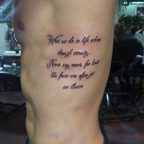 Words Rib Scripture Tattoo Men, Cursive Rib Tattoo Men, Mens Rib Tattoo Ideas Quotes, Rib Writing Tattoo Men, Rib Tattoos For Guys Quotes, Side Tattoos For Men Ribs, Side Tattoos For Men, Rib Writing Tattoo, Ribs Quotes