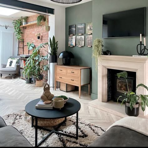 Green Lounge Room Ideas, Dark Sage Living Room, Earthy Green Living Room Walls, Sage Green Living Room With Fireplace, Dining Room Snug Ideas, Dark Sage Green Living Room, Safe Green Living Room Decor, Dark Sage Room, Green Living Room With Fireplace