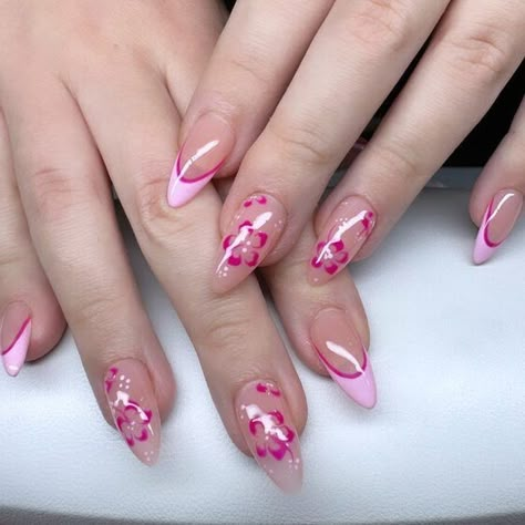 These nails seamlessly fuse the enduring elegance of floral motifs with contemporary flair, showcasing delicate pink blossoms against a neutral nude backdrop. The striking juxtaposition of vibrant pink and subdued nude enhances each detail, catering to individuals who embrace a harmonious blend of traditional charm and modern aesthetics. Chrome Floral Nails, Summer Holiday Nails, Nail Aesthetics, Mail Inspo, Future Nails, Ideas Uñas, Cute Simple Nails, Summery Nails, Nails Only