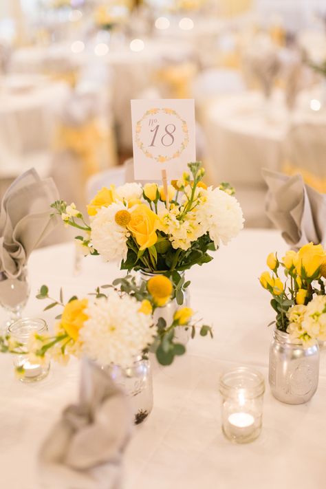 Yellow and White Centerpiece with Mums and Craspedia Yellow And White Decorations, White And Yellow Wedding Decoration, Wedding Flowers Yellow And White, Yellow And White Party, Yellow And White Flower Arrangements, White And Yellow Flower Arrangements, Wedding Decorations Yellow, Yellow And White Wedding Table Decor, Yellow Centrepiece Ideas