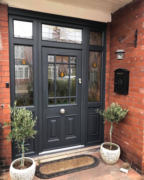 Black is a classic and timeless color that is often associated with sophistication, elegance, and power. A #blackfrontdoor can create a sense of luxury and refinement, making it a popular choice for homes with traditional architecture. Front Doors Black, Black Composite Front Door, Black Composite Door, Small House Extensions, Front Door Black, Upvc Front Door, White Front Door, Black Front Door, Dining Booth