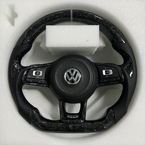 Forged carbon fiber LED steering wheel for Vw Spec: ✅Carbon fiber Top and Bottom ✅With carbon fiber trim ✅Custom shape and color ✅Perforated Leather sides ✅Gray Stitches Custom Steering Wheel, Car Obsession, Forged Carbon Fiber, Polo Gti, Volkswagen Logo, Audi Cars, Perforated Leather, Whips, Super Cars