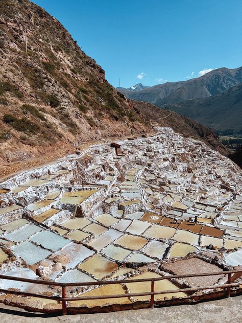 Need another cool thing to see in Peru? Salineras De Maras, or the Salt mines of Maras are largest salt extraction centers of prehispanic origin in Peru. Maras town is also in the Sacred valley of the Incas. You can get to this village by public transport. Follow along for more places to visit! Maras Salt Mines Peru, Sacred Valley Peru, Peru Trip, Travel Peru, Salt Mine, Andes Mountains, Sacred Valley, Peru Travel, Mural Art