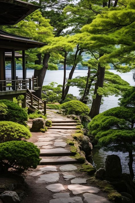 A green walkway by a tranquil lake in a Japanese garden, infused with grid-like designs. Bathed in tones of light white and dark indigo, the scene exudes old-world charm, meticulously crafted with rich layers. Backyard Patio On A Budget, Entertainment Backyard, House Front Garden, Front Garden Design Ideas, Patio On A Budget, Japanese Backyard, Backyard Entertainment, Japanese Rock Garden, Japanese Garden Landscape