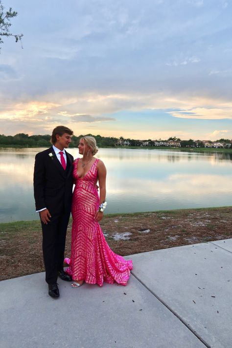 prom, prom picture inspo, pink dress, pink prom dress, pink matching tie, florida, prom in florida, jovani gowns, jovani prom, sparkly dress, sparkly prom dress, palm trees, boyfriend,date,couple,teenagers, highschool, highschool dance, senior prom, junior prom, tall couple, dress inspo, prom inspo, love, in love, highschool sweethearts, lake, prom picture Pink Jovani Prom Dress, Lake Prom Pictures, Pink Prom Inspo Couple, Pink Prom Dresses Couple, Pink Prom Date Couple, Hot Pink Prom Dress With Date, Pink Prom Dresses With Date, Sparkly Pink Prom Dress, Hot Pink Prom Couple