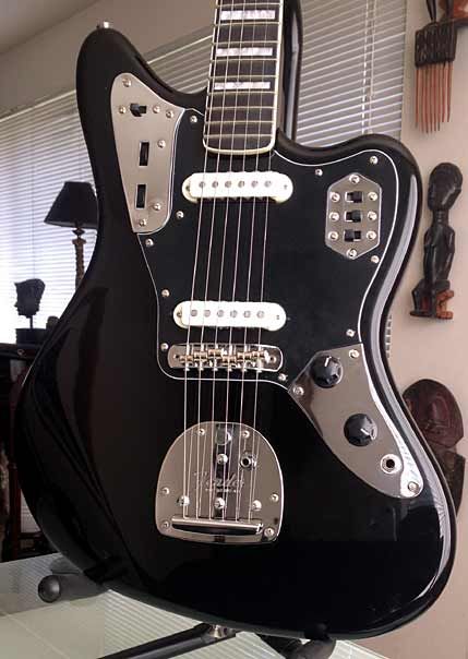 YorMajesty's Black 66 Reissued Fender Jaguar Guitar, Black Jaguar Neck, 1966 Ebony Fret board W/Block Inlay & Binding  (Black Matching HeadStock) Jaguar Guitar Aesthetic, Jaguar Guitar, Jaguar Black, Fender Guitar Amps, Black Acoustic Guitar, Fender Jazzmaster, Guitar Illustration, Guitar Obsession, Black Jaguar