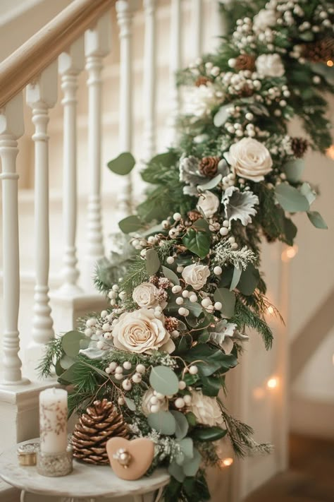 Transform your space with luxurious Christmas home decor. This elegant garland with white roses, pinecones, and lush greenery brings a winter wonderland indoors. Perfect for adding a sophisticated touch to your festivities. #ChristmasHomeDecor #HolidayStyle #ElegantDecor White Christmas Staircase Decor, Decorated Stairs, Winter Wonderland Christmas Decor, Christmas Stairway, Christmas Shop Displays, Christmas Garland On Stairs, White Christmas Garland, Green White Christmas, Christmas Banister