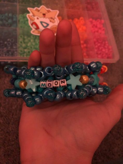 Fnaf moon drop cuff Fnaf Kandi, Sun And Moon Drop, Kandi Projects, Bracelets Kandi, Kandi Beads, Kandi Cuff Patterns, Kandi Inspo, Diy Kandi Bracelets, Pony Bead Bracelets