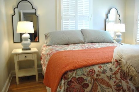 Mirrors Make a Big Impact in A Small Bedroom - The Decorologist Mirrors Over Nightstands, Mirrors Behind Nightstand Ideas, Mirrored Dresser Bedroom, Mirror Behind Nightstand, Homey Touches, Bold Bedding, Blue Gray Bedroom, Mirror Placement, Designer Bedroom