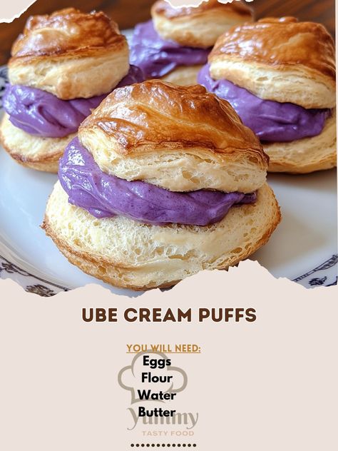 💜✨ Ube Cream Puffs: Delight in the creamy, purple magic of ube-filled pastries! 💜 #DessertHeaven #UbeLovers Ube Cream Puffs Ingredients: Butter (1/2 cup) Water (1 cup) Flour (1 cup) Eggs (4) Ube jam (1 cup) Heavy cream (1 cup) Sugar (1/4 cup) Vanilla extract (1 tsp) Instructions: Boil butter and water, stir in flour until a ball forms. Cool slightly, beat in eggs one at a time. Pipe onto baking sheet, bake at 400°F for 25 minutes. Whip ube jam, heavy cream, sugar, and vanilla. Fill puffs.... Filled Pastries, Ube Jam, Purple Magic, Cream Puffs, Baking Sheet, Heavy Cream, 1 Cup, Vanilla Extract, Cream Cheese