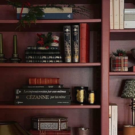 Charlotte Reiss on Instagram: "Why not? And just like that this room is finished. Feeling bold I went with a deep vibrant red on the bookshelves and I couldn’t be happier. Somewhere along the way the past 2 years color has seeped into back into my life, bright unexpected bold colors. It makes me happy, feels nurturing and well, why not? Moving into 2022 I think that’s going to be my motto. I always say to you all turn left instead of right and now I think I’ll add a little shoulder shrug, a knowing smile and a “why not?!” #vivietmargot #shelfie #raddichio #cornersofmyhome #paintitred #countrycottage #traditionalstyle #frenchfarmhouse #livinginfrance" Maroon Bookshelf, Burgundy Bookshelves, Red Bookshelves, Charlotte Reiss, Library Colors, Red Library, Burgundy Office, Red Bookcase, Red Bookshelf