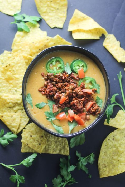 Vegan nacho cheese sauce is easy to make and just as indulgent as the real thing. It's nut free and the perfect dip for tortillas or to pour over tacos and vegan nachos! #vegannachocheese #vegancheese Raw Vegan Nachos, Easy Vegan Nacho Cheese, Cashew Nacho Cheese, Dairy Free Nacho Cheese, What Is Vegan, Vegan Nacho Cheese Nut Free, Vegan Nacho Cheese Sauce, Vegan Cheese Substitute, Vegan Nacho Cheese