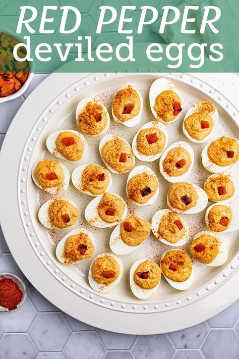 These roasted red pepper deviled eggs are a delightful twist on the classic. The red pepper gives the filling a smoky, slightly sweet flavor. #eggs #eggrecipes #deviledeggs #hardboiledeggs #esterrecipes #easterappetizers #appetizers #instantpotrecipes #robustrecipes Red Pepper Deviled Eggs, Roasted Red Pepper Deviled Eggs, Cooking Hard Boiled Eggs, Roasted Red Pepper Dip, Making Hard Boiled Eggs, Best Brunch Recipes, Deviled Eggs Easy, Roasted Red Pepper Hummus, Easter Appetizers