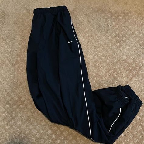 Vintage 90s nike track pants Old Nike Track Pants, Retro Nike Pants, Nike 90s Track Pants, Retro Nike Clothes, Nike Trackpants Y2k, Navy Blue Nike Track Pants, Nike Blue Pants, Nike Joggers Vintage, Nike Baggy Track Pants Outfit