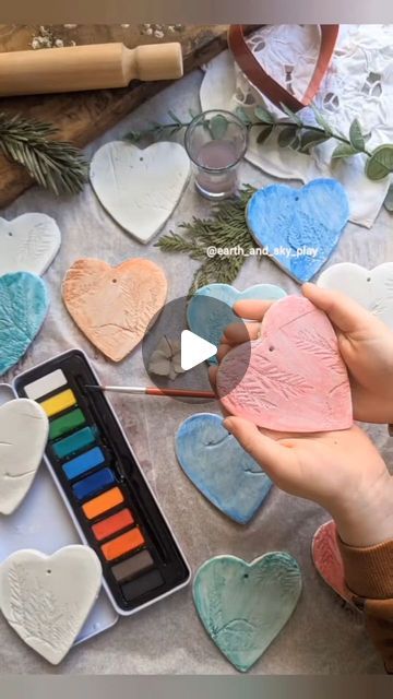 🌿Anna☀️| Crafts, Play & Learning on Instagram: "Nature Pressed Clay Hearts ♥️  Sharing with you a project from last year in which we were challenged to provide a low cost crafting idea for families during Valentine's and half term break!  We used about a third of our clay to make more than 20 hearts and decorated them by using some of our dried leaf and flower stash to make impressions. Once dried, we painted over then using our watercolour palette ♥️ I love how each one turned out.  You can try making your own air dry clay too! Ours never comes out very well 🙈 so this pack is handy to have in our crafting kit and is by @das_fila I rolled these about 5mm deep and they took about 1-2 days to air dry!  Keep as ornaments, use as coasters, make a mobile, use as gift tags or give away as a gi Watercolour Palette, Anna Craft, Clay Hearts, Make A Mobile, Craft Day, Paper Embroidery, Clay Ornaments, Clay Flowers, Dry Clay