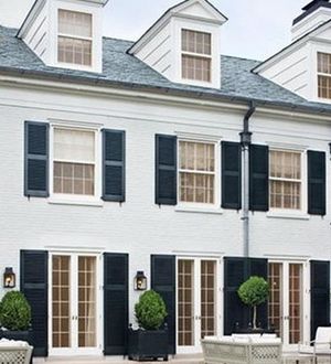 White House With Black Shutters, House With Black Shutters, Black And White House Exterior, 2023 Landscape, Painting Brick, White Exterior Houses, House Colours, Black Shutters, Yellow Door