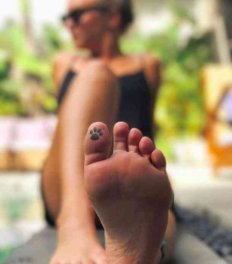 40 Best Hidden Tattoo Ideas | YourTango Tatoo Dog, Toe Tattoos, Pawprint Tattoo, Hidden Tattoos, Hamsa Tattoo, Paw Tattoo, Mother Tattoos, Foto Tips, Tattoo Life