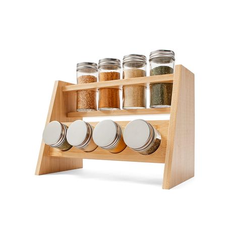 This Bamboo Spice Rack Set is perfect for storing all your spices and herbs - a must-have kitchen accessory. Product Details Spices are not included. Includes 8 x spice jars and 1 x rack Capacity: 85ml (Each jar) Dimensions/Size:Overall dimensions: 21.3cm (H) x 25.1cm (W) x 12.4cm (D) Glass bottle: 9.3cm (H) x 4.4cm (Dia.) Lid: 1.3cm (H) x 4.5cm (Dia.) Rack: 17.5cm (H) x 25cm (W) x 12cm (D) Shaker top: 0.3cm (H) x 3.8cm (Dia.) Material:Glass bottle: Soda-lime glass Lid: Stainless iron Rack: Bamb Spices Organizer, Organised Kitchen, Essential Spices, Bamboo Spice Rack, Cute Diy Room Decor, Nature Inspired Decor, Bamboo Design, Shop Storage, Spices And Herbs