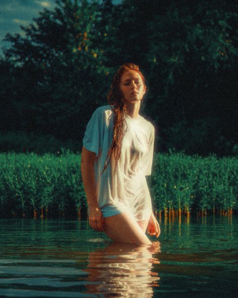 Ripples and reeds @lesliehacker13 . . . . . #waterportraits #watershot #watershoot #warmtones #wettshirt #analogphotography… | Instagram Water Shoot Ideas, Wet Teeshirts Photoshoot, Water Portrait Photography, Pictures In The Rain, River Shoot, River Photoshoot, Rainy River, Lake Portrait, Rain Street