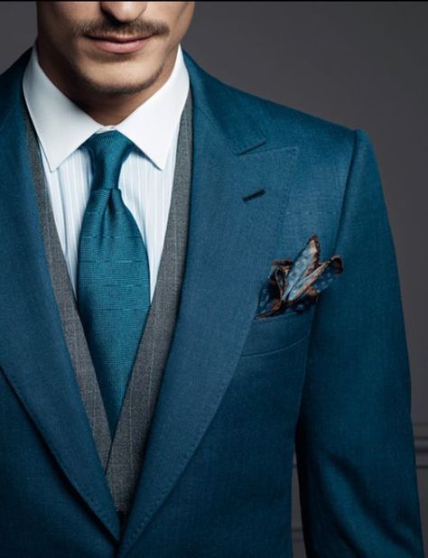 This is almost like a dark teal instead of blue and I like it a lot. Simple color scheme with gray vest. Gray vest is perfect for almost all blue/ teal suits.Follow my blog at EverybodyLovesSuits Teal Groomsmen, Teal Suit, Best Wedding Suits, Dark Blue Suit, Suits Men, Men With Street Style, Teal Wedding, Groomsmen Attire, Sharp Dressed Man