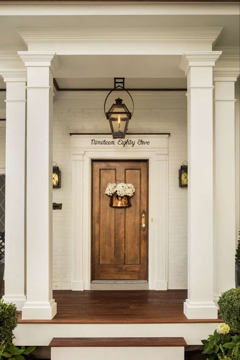 Front door of classic traditional house by The Fox Group. #frontdoor #classicarchitecture #housedesign #houseexterior #beautifulfrontdoor Timeless Home Design, The Fox Group, Fox Group, Exterior Columns, Front Porch Columns, Bathroom Freestanding, Brick Columns, White Exterior Houses, Timeless Interior Design