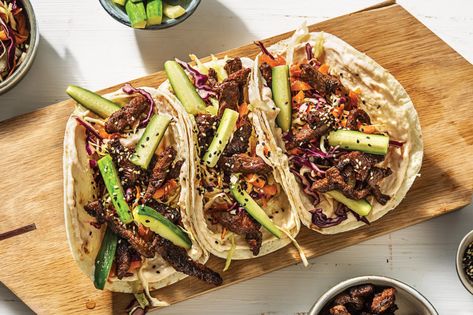 Japanese Beef Tacos Recipe | HelloFresh Sesame Slaw, Hello Fresh Dinners, Fusion Tacos, Cucumber Vegetable, Asian Seasoning, Beef Tacos Recipes, Pickled Cucumbers, Japanese Beef, Quick Pickled Cucumbers