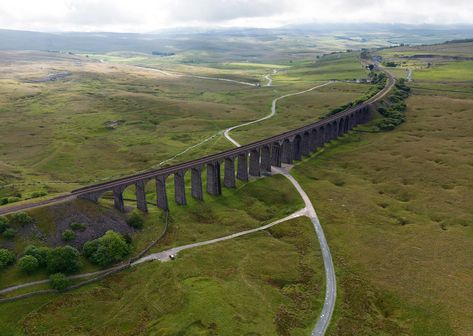 Ribblehead viaduct aerial image - completed 1874. Over 100 men lost their lives during its construction. North Yorkshire UK Ribblehead Viaduct, Wedding Workout, Yorkshire Uk, Aerial Images, North Yorkshire, Layout Ideas, Wales England, Design Decor, North East