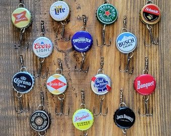 Beer Bottle Cap Art, Beer Bottle Cap Crafts, Bottle Cap Fishing Lures, Summer Shandy, Pabst Blue Ribbon Beer, Diy Fishing, Twisted Tea, Cap Art, Bottle Cap Art