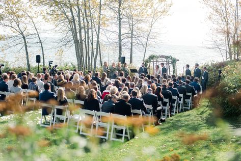 After years of traveling to the North Shore and a proposal there in 2016, Kaitlin Sundberg (30 and a marketing account manager) and Levi Lowell (30 and a senior graphic designer) knew it’d be the place they’d tie the knot. “The beauty and awe of the big lake is unmatched,” Kaitlin says. Levi illustrated the save-the-dates, inviting guests to the Lutsen Resort for a ceremony overlooking Lake Superior. The pair wed under a greenery-filled arbor, where Kaitlin’s brother led the ceremony, which ... Lake Superior Wedding, Minnesota Lake, Big Lake, Account Manager, Rustic Fall Wedding, Montana Wedding, Wedding Activities, San Juan Islands, Lake Wedding