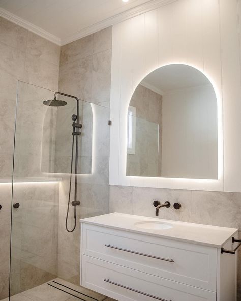 How incredible is this bathroom space by @NavyBoxConstructions?! Achieving the spa like feeling with the Posh Solus back-to-corner bath paired with the timeless white shaker style Kado Lux vanity. Contrasted by the Milli Pure tapware in brushed gunmetal with beige, textured tiles for a bright and inviting bathroom. 

Reece featured products 🛁 :
Milli Pure tapware, Milli Mood shower, Kado Lux vanity, Posh Solus back-to-corner freestanding bath. Brushed Gunmetal Bathroom, White And Beige Bathroom, White Shaker Vanity, Gunmetal Tapware, Inviting Bathroom, Reece Bathroom, Textured Tiles, Shaker Vanity, Neutral Bathroom