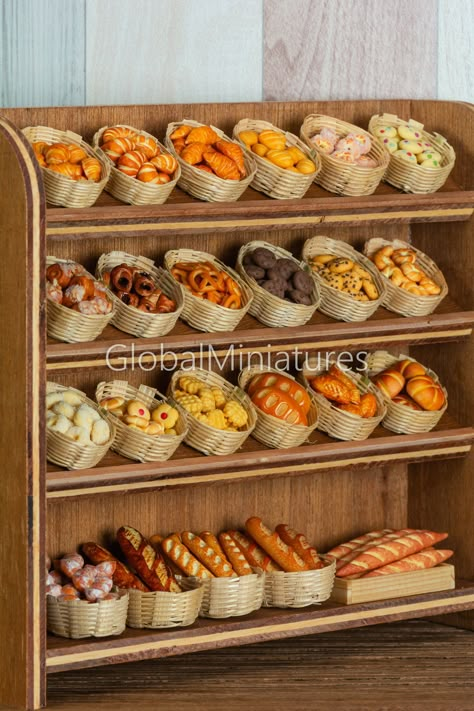 "This listing totally have the following items: - 268 pieces of miniatures bakery and pastry (as stated in the product image). - 23 pieces of miniatures container. - 1 piece of miniatures shelf. Shelf wasn't based on any dollhouse scale, made of plywood, wood preserved oil coated. All other elements were mostly 1:12 dollhouse scale, made of clay, wood and bamboo. Approximate size of shelf is 2 3/8\" x 9\" x 8\", width, length and height respectively. Please be noted that all elements weren't glu Miniature Bakery Diy, Bakery Decor Ideas, Mini Bakery Shop Design, Bakery Dollhouse, Clay Bakery, Bakery Miniature, Tiny Bakery, Dollhouse Bakery, Miniature Shelf