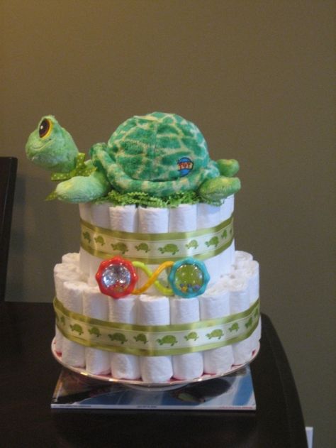 Turtle diaper cake Turtle Baby Shower Cake, Turtle Diaper Cake, Diaper Cake Ideas, Cake For Baby Shower, Turtle Baby Shower, Cake For Baby, Small Turtle, Neutral Green, Turtle Cake