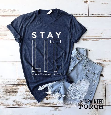 Find this product and many more on our website www.thepaintedporch.coWe love the bold message of this shirt! Features a fun typographic design that says, Stay Lit - Matthew 5:14 Makes a great gift for Christian youths! Unisex sized.**THANK YOU FOR SUPPORTING THE AMERICAN DREAM**When you shop from T Youth Group Shirt, Youth Group Shirts, T Shirt Text Design, Teen Shirts, Church Youth Group, Bible Shirts, Christian Shirts Designs, Church Shirt, Shirts Cute