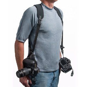 OP/TECH USA 6501082 Double Sling, Neoprene Harness Carries 2 Cameras in Sling Style (Black) Price: $26.29 Hairdressing Trolley, Digital Camera Accessories, Custom Strap, Makeup Train Case, Photo Bag, Shoulder Sling, Camera Straps, Camera Strap, Cool Backpacks