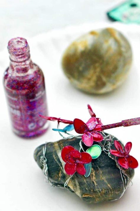 Learn how to make Nail Polish and Wire Flowers with this easy craft tutorial! Use them in gift wrapping or a mini floral arrangement. #WelcometoNanas #NailPolishFlowers #NailPolishCraft #WireCraft Polish Flowers, Nail Polish Flowers, Nail Polish Crafts, Wire Flowers, Celebrate Mom, Craft Tutorial, Easy Craft, Themed Crafts, Wire Crafts