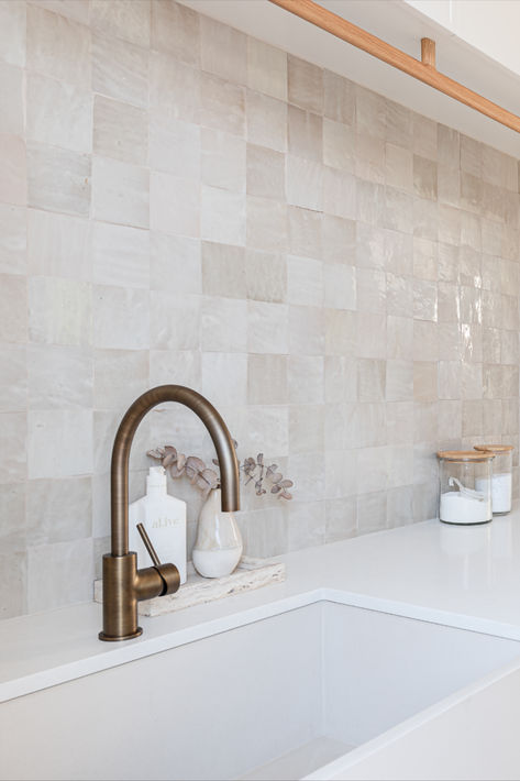 A beautiful space full of texture featuring herringbone floor tiles, handmade splashback tiles, timber hanging rail and Yabby Antique Brass  Round Kitchen Mixer. Laundry design by @headinteriordesign Builder @_bldbl Photography @jodyallenphoto Antique Brass Yabby, Laundry Splashback Ideas, Tile Splashback Kitchen, Herringbone Floor Tiles, Laundry Tiles, Bnb Decor, Brass Tapware, Splashback Ideas, Splashback Kitchen