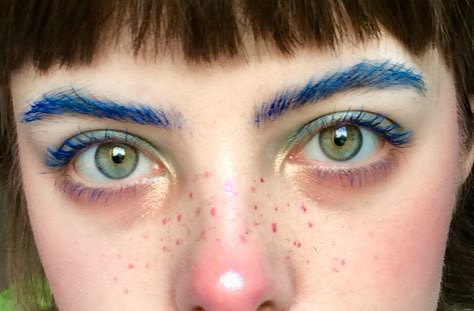 Blue brows green eyes red nose freckles rainbow Blue Freckles Makeup, Colourful Eyebrows, Red Nose Makeup, Clown Aesthetic Makeup, Rainbow Freckles Tattoo, Red And Green Makeup, Colorful Freckles, Aesthetic Freckles, Rainbow Freckles