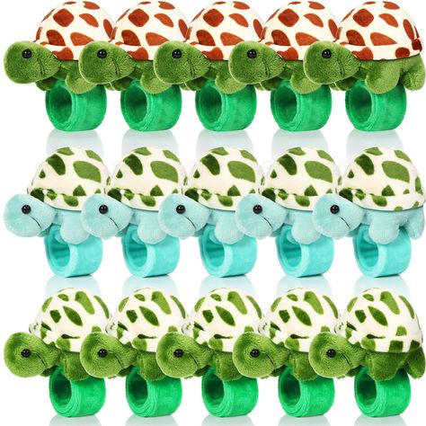 PRICES MAY VARY. Sufficient Quantity: you will receive 15 pieces stuffed turtle slap bracelet party favors in 3 different styles, 5 pieces for each color, which are exquisite and adorable, can easily get people's attention; You can wear them, share with others, or keep them as special bracelet collections Proper Size: the stuffed turtle animal slap bracelets measure about 8.66 inches/ 22 cm, fit comfortably on most wrists without slipping off, making them ideal accessories for most people who lo Turtle Birthday Party, Turtle Birthday Theme, Turtle Baby Shower, Turtle Birthday Parties, Island Party, Ocean Theme Party, Hungry Caterpillar Birthday, Turtle Decor, Animal Bracelet