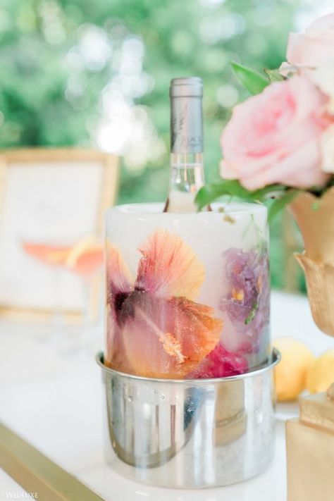 #wedluxe #wedluxemagazine #flowers #ice #cooler #wine #cocktailhour #drinks #creative #inspiration Flower Ice Wine Holder, White Bridal Party, Ice Ring, Floral Ice, Flower Ice, Ice Wine, Ice Cooler, Wedding Theme Colors, Lesbian Wedding