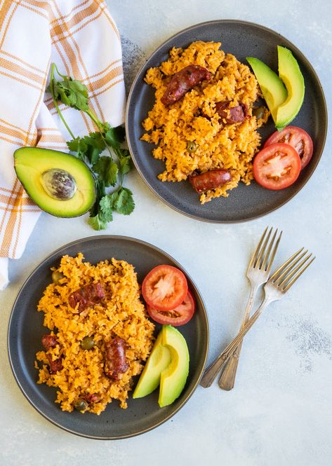 Dominican Rice with Sausage aka Locrio de Longaniza is a one-pot meal made with rice and Dominican pork sausage. This flavorful dish is a staple in the Dominican Republic, and perfect for weeknight dinner. #sausage #rice #onepotmeal #recipe #dominicanfood #longaniza Longaniza Recipe, Dominican Rice, Rice With Sausage, Puerto Rican Rice, Dominicano Recipes, Avocado And Tomato, Sausage Rice, Dominican Food, Colombian Food