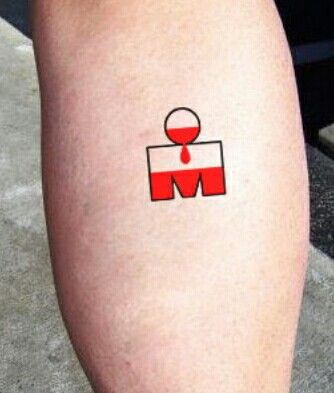 Half Ironman M Dot Tattoo Ironman, Half Ironman Tattoo, Ironman 70.3 Tattoo, Running Tattoos, Ironman Triathlon Tattoo, Ironman Tattoo, Small Tattoo Design, Iron Tattoo, Triathlon Tattoo