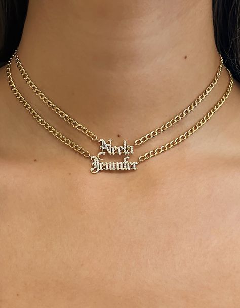 A fun chic personalized Cuban link diamond name choker, available in your choice of 14k gold color and font type. Wear it up or down by itself or layered, this choker will be your new obsession! Note: The personalization box is case sensitive, so type in exactly how you would like your name to appear, with the correct upper/lowercase font. Script font is not offered in all capitalization. Limited to 12 characters. Length: Adjustable 12"-16" Links: Approx. 5mm(W) Chain Weight: Approx. 3 grams Dia Double Plated Name Necklace, Cuban Link Choker, Name Choker, Jewelry Accessories Ideas, Cozy Room Decor, White Gold Necklaces, Gold Initial, New Obsession, Cuban Link Chain