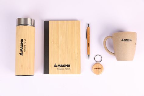 Discover our eco-friendly Welcome Kit, created just for Magna. Embrace sustainability with our bamboo flask, bamboo diary, bamboo pen, rice husk mug, and wooden keychain, all of which prominently feature the company logo. Make a long-lasting impact while reducing your carbon footprint. Contact us right away to learn more about our corporate gifting options: +91 9594070940 | info@brandstik.com Promotional Items Marketing, Welcome Kit, Rice Husk, Bamboo Pen, Wooden Keychain, Corporate Gifting, Promotional Items, Promotional Item, Carbon Footprint