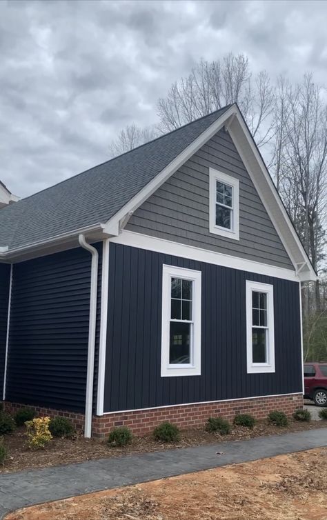 Navy Vinyl Siding House, Dark Grey Homes, Brick And Navy House Exterior, Dark Blue Home Exterior, Dark Blue House Exterior With Wood, Brownstone Exterior, Siding Inspiration, Navy House Exterior, Blue Home Exterior