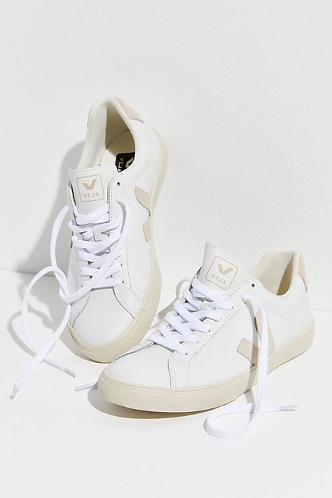 Made with sustainable materials, these retro style leather sneakers are featured in a low-top design with suede details and a tonal logo on the side. * Padded collar and footbed * Lace-up front | Veja Esplar Sneakers at Free People in Tan, Size: EU 37 Veja Esplar Sneakers, Style Inspiration Minimalist, Veja Esplar, White Lavender, Minimalist Accessories, Veja Sneakers, Free People Store, High Quality Shoes, Style Minimalist