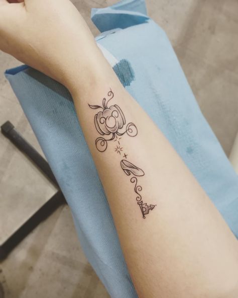 80 Tiny and Adorable Disney Princess Tattoos For Fans of Fairy Tales and Happily Ever Afters Small Cinderella Tattoos, Disney Tattoos Cinderella, Cinderella Tattoo Ideas, Cinderella Tattoos, Small Wing Tattoos, Tiny Disney Tattoo, Princess Tattoos, Cinderella Tattoo, Disney Inspired Tattoos